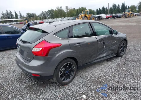 2012 Ford Focus Titanium z USA, uszkodzony, nr VIN 1FAHP3N28CL210557